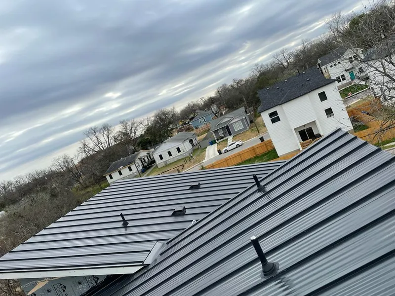 Standing seam metal roof panels with vents for Skylight Repair in Penn Hills